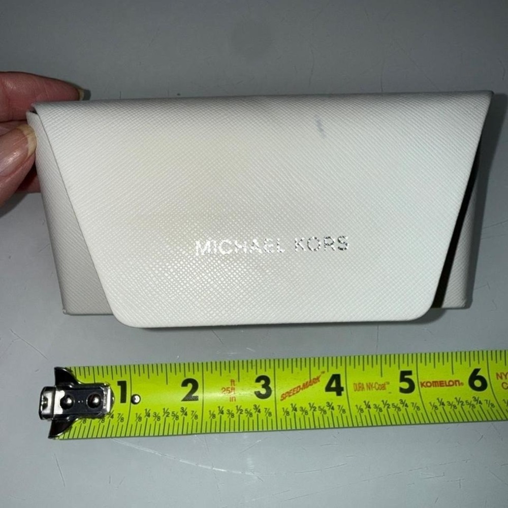 Michael Kors White leather‎ eyeglass holder with a minimalist design